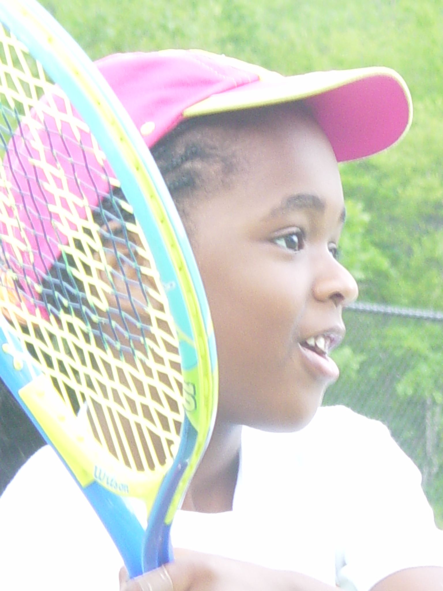 Young girlr with tennis racket